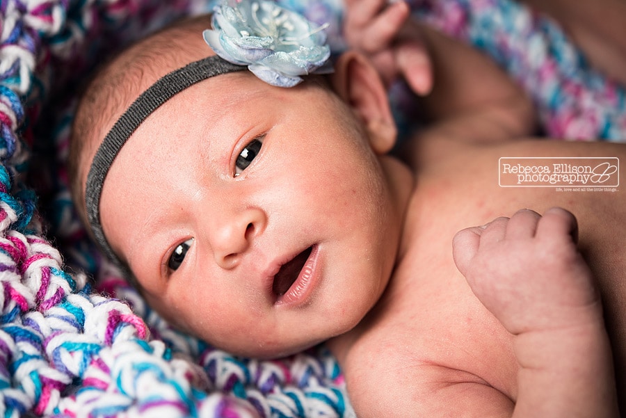 lightly retouched photo of a newborn baby girl by Seattle newborn photographer Rebecca Ellison