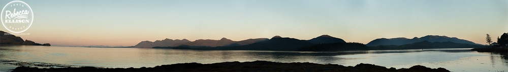 Ketchikan Sunrise panorama of the ocean and mountains photographed by Rebecca Ellison Photography