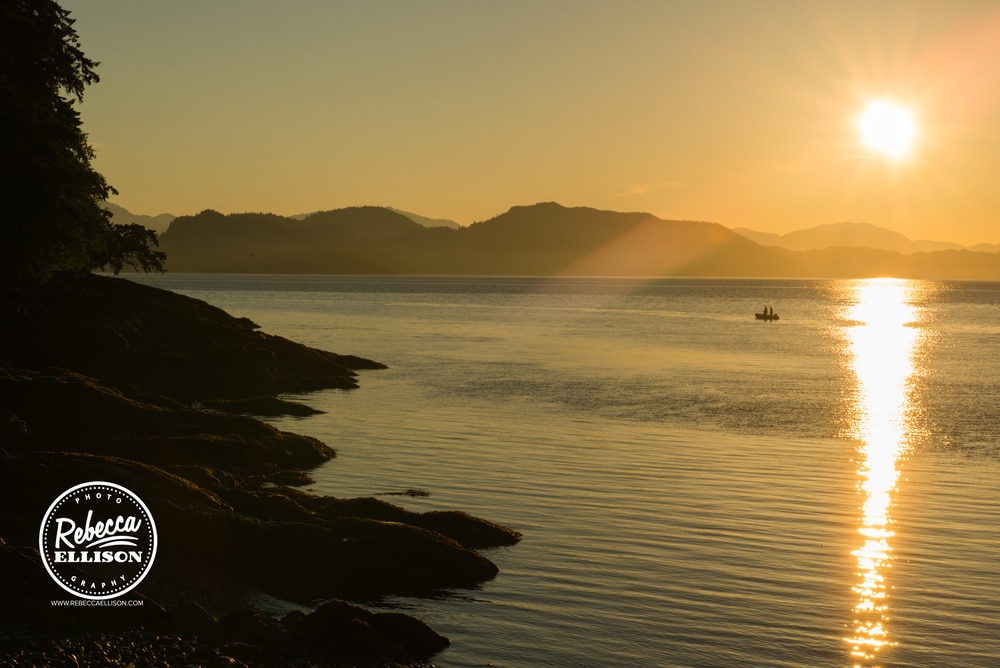 Ketchikan Sunrise over the cean and rocky beach photographed by Rebecca Ellison Photography