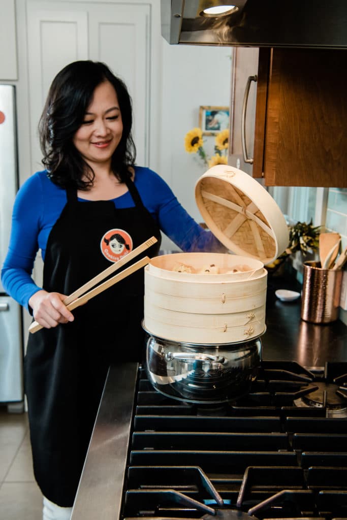 personal chef branding photos in kitchen with dumplings