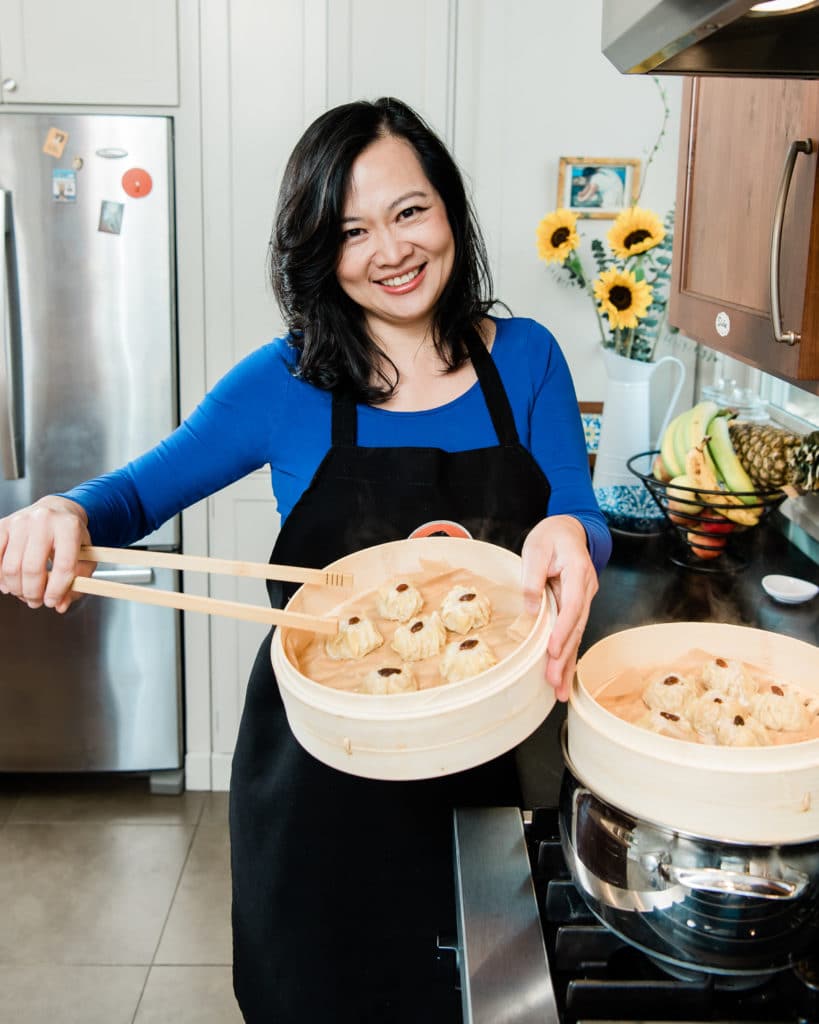 personal chef branding photos in kitchen with dumplings