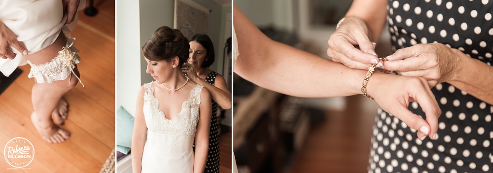 Bride puts on her wedding jewelry including a pearl necklace and gold bracelet photographed by Rebecca Ellison Photography
