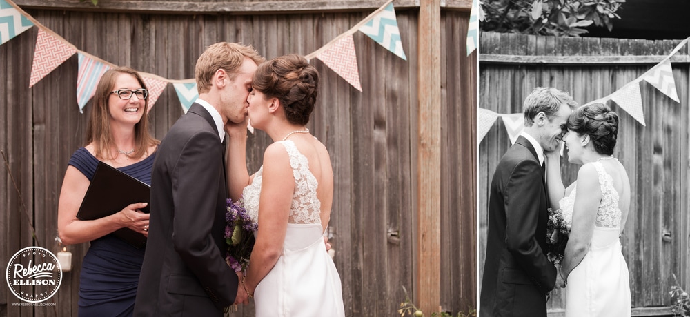 A bride and groom kiss during their intimate backyard wedding ceremony photographed by Rebecca Ellison photography