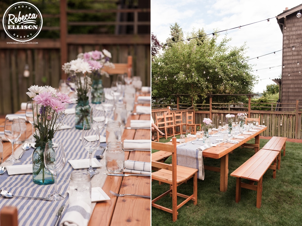 The table is set at an intimate backyard wedding featuring blue and white table runners and lavender and white flowers photographed by Rebecca Ellison Photography