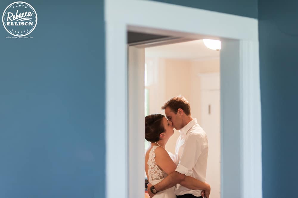 Bride and groom share a private moment on their wedding day photographed by Seattle wedding photographer Rebecca Ellison