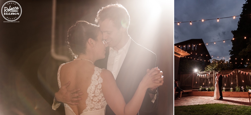 Bride and groom share a dance at their intimate backyard wedding featuring penant banners and light strings photography by Rebecca Ellison