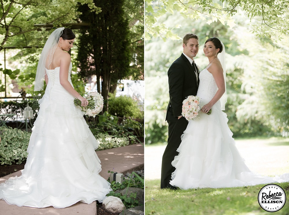 Bride in a strapless white wedding dress with a corset back stands on a garden path before her outdoor garden wedding photography by Rebecca Ellison