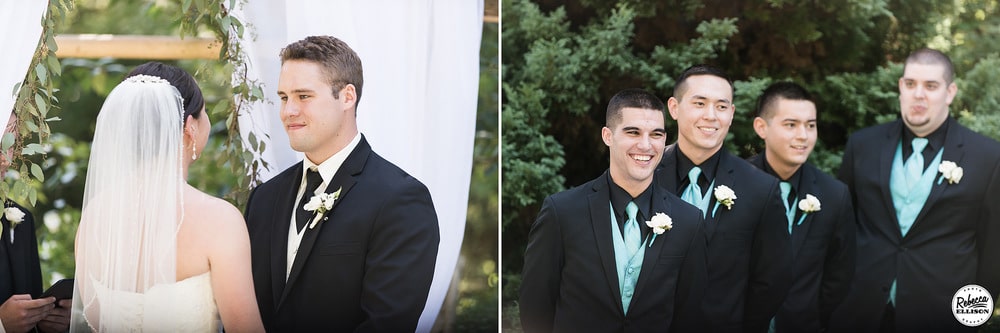 Wedding ceremony at an outdoor garden wedding featuring a wooden arbor and black suits with blue vest and ties photographed by Rebecca Ellison Photography