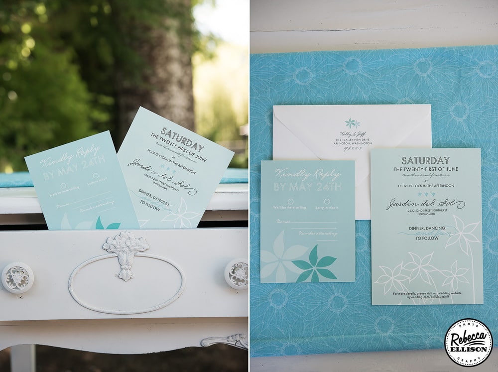 Blue wedding invitation sit in a vintage desk for an outdoor garden wedding